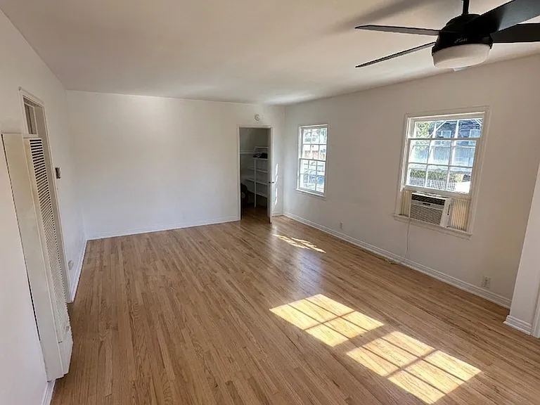 spacious living area full of natural light