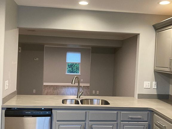 View from kitchen through dining room into living room