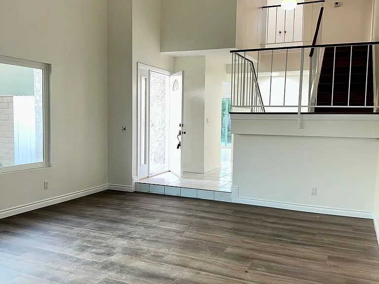 Front door entrance to the hallway. Picture taken from Living room