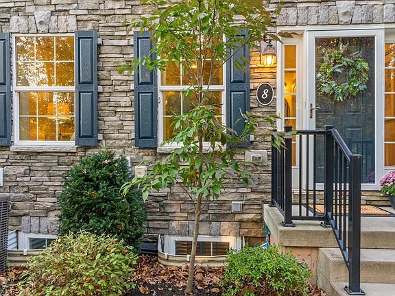 Private front entryway facing wooded area