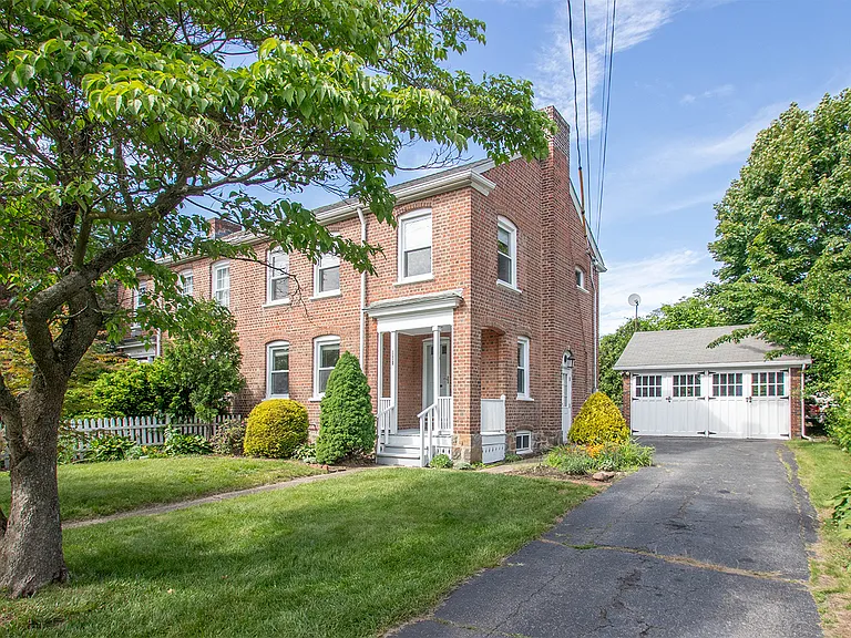Front driveway and 2 car detached garage