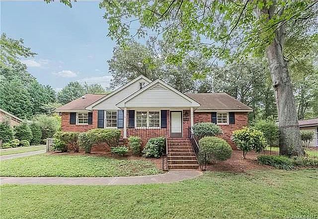 Front of the home from large front yard