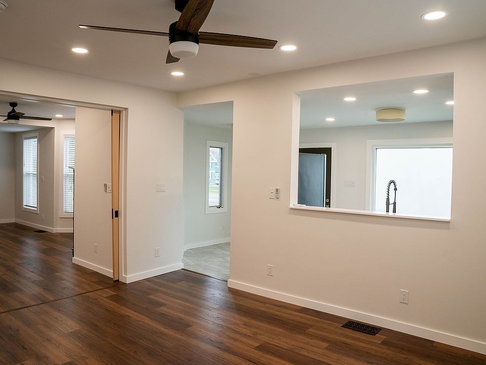 Large, open room. Perfect for a living room or dining room. Includes: mini split heat pump head, ceiling fan, dimmable lighting