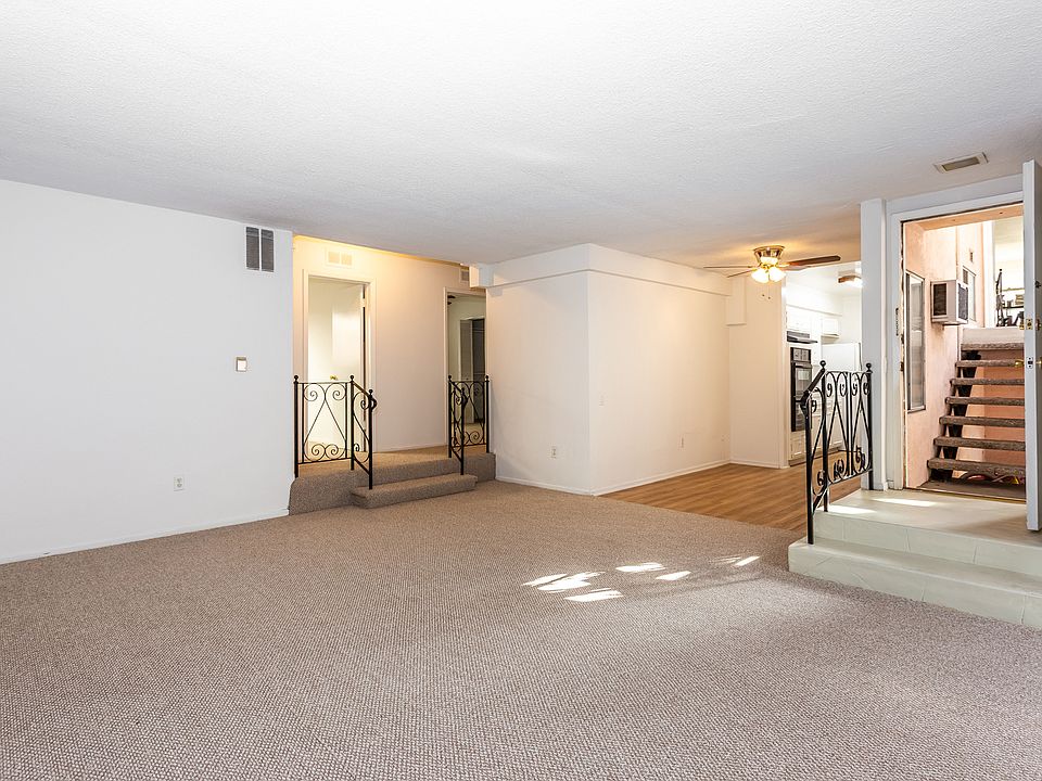 Step in and you'll see a huge open living room with lots of light; new carpet.