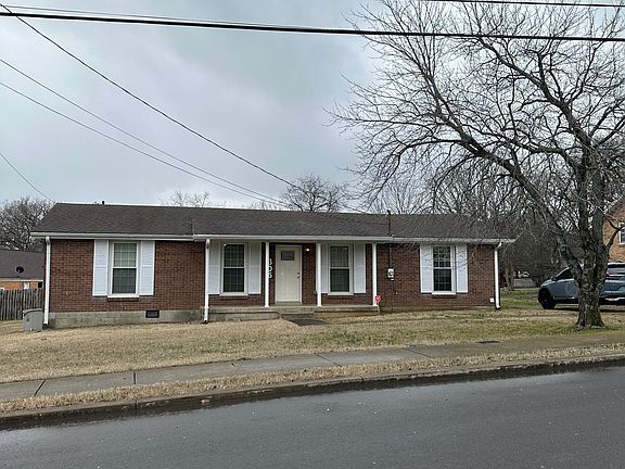 Far right window is garage with washer and dryer. Far left windows are bedrooms