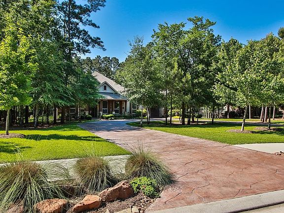 Welcome Home!  A one story home located in the highly desirable community of Woodforest, nestled on a acre lot, fully landscaped and with many trees. The backyard, offers a spectacular pool featuring waterfalls, edge less waterfall spa, covered patio with a large cabana.