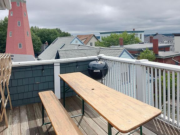 Private deck neighbors Portland observatory. Sunset city views and toward Back Bay.