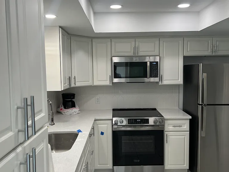 Kitchen new s/s appliances.