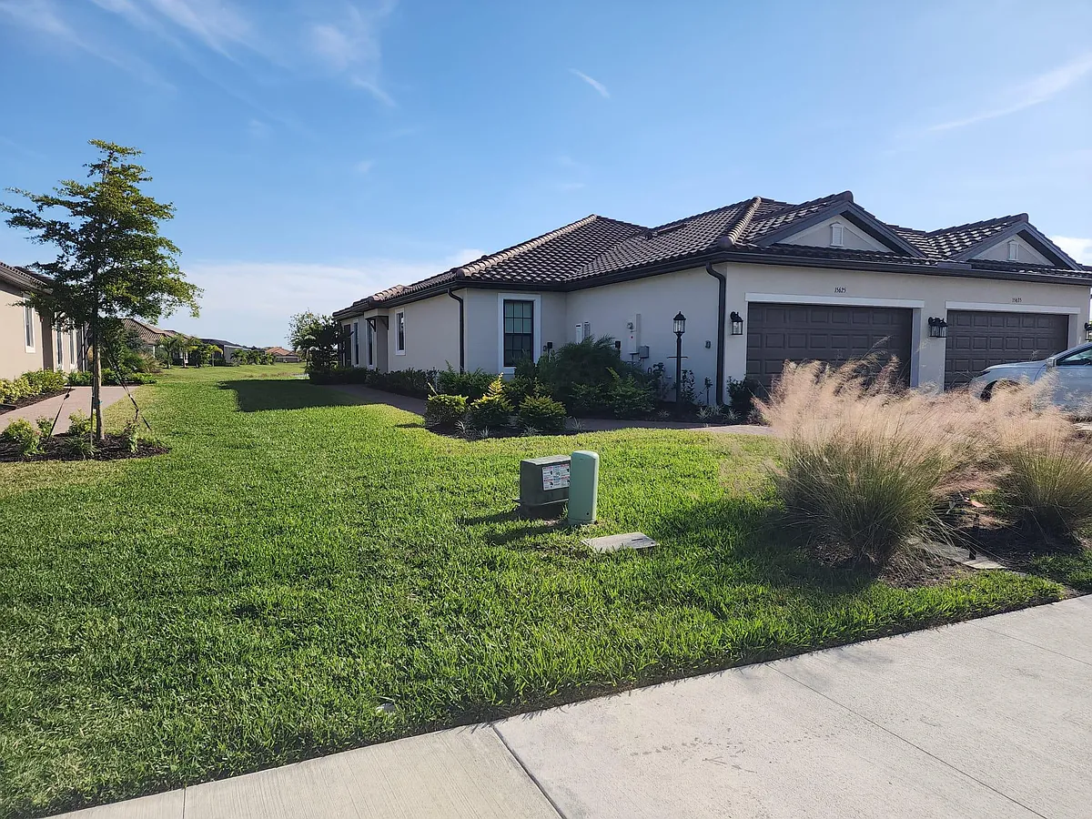 Front yard looking East - 15625 Sacile Ln