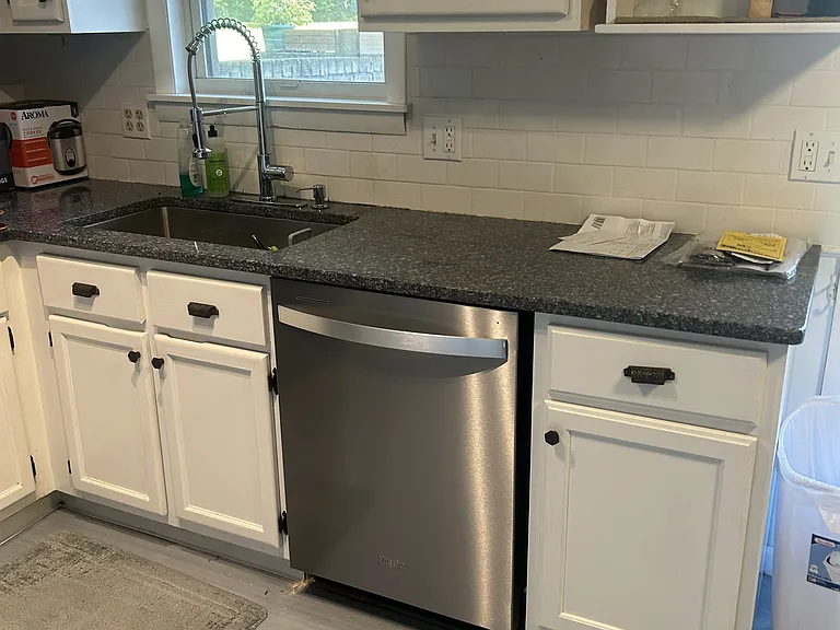 Kitchen also includes new stainless steel dishwasher and faucet
