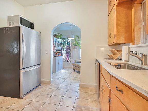 Kitchen leading to breakfast nook
