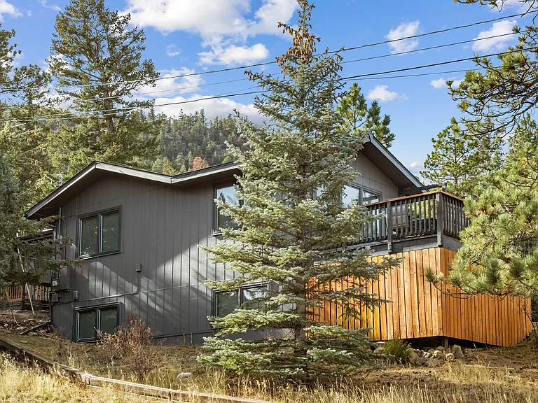 Side of home and front deck