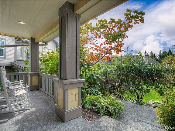 Desirable location within the community, this residence is located just off the central courtyard.  Enjoy your morning coffee on the sun-dappled country porch. 