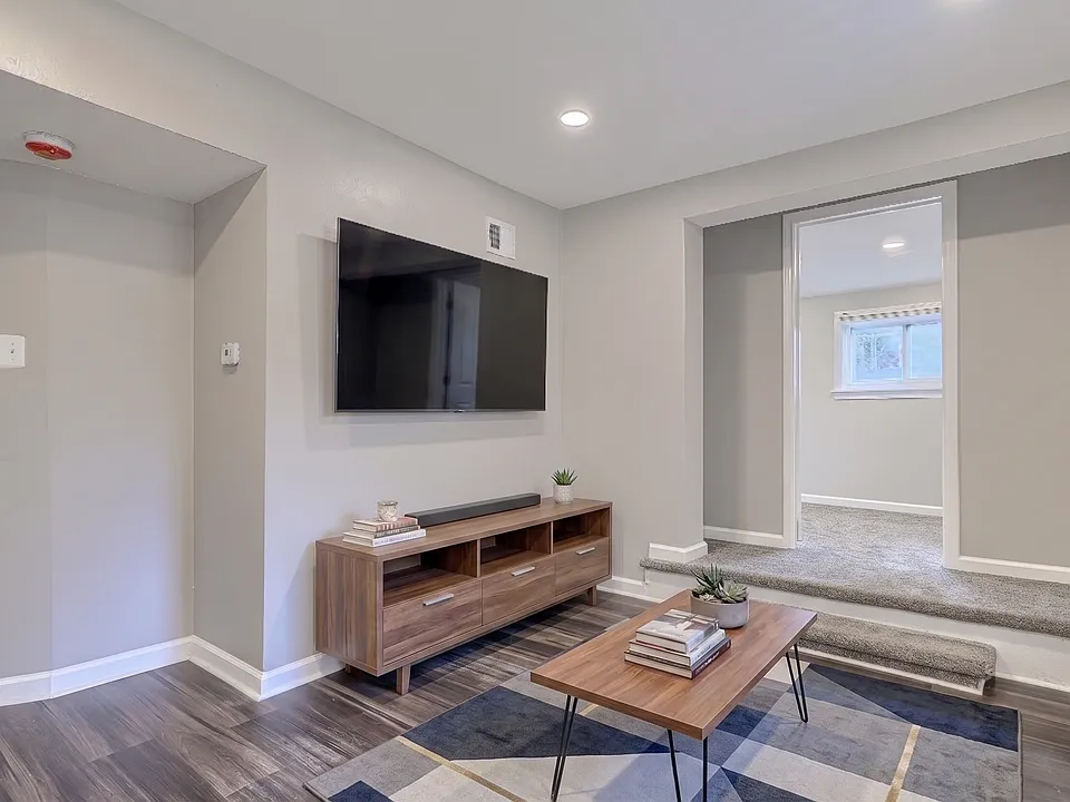 Another angle of the virtually staged family room.