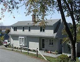 Sits up on hill overlooking Lobster Cove & Annisquam River