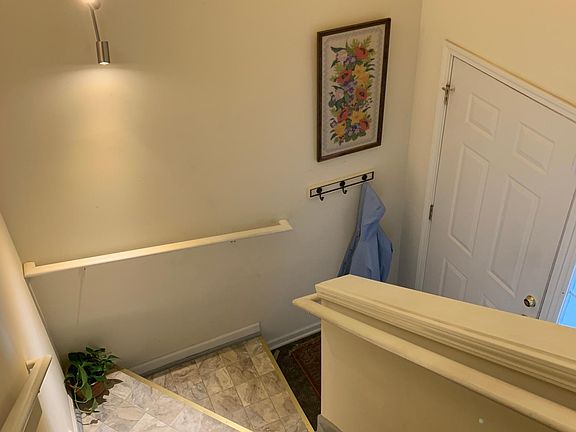 Entry -front door and garage entrance on bottom level. Walk upstairs to main level