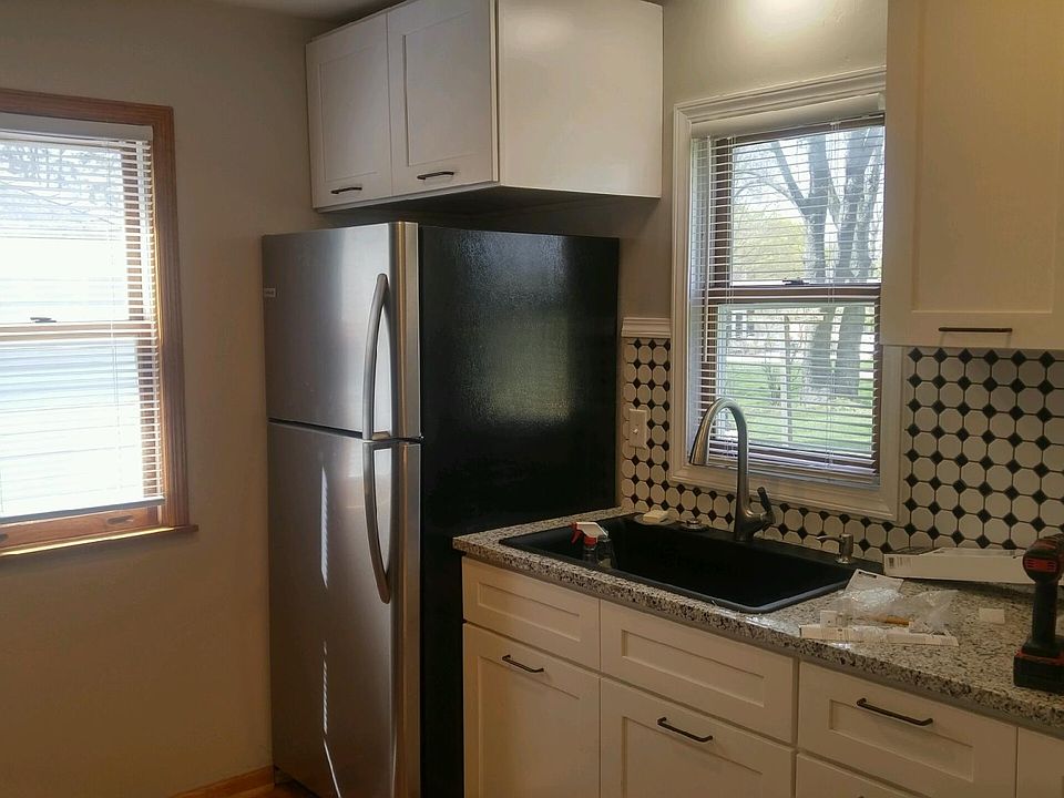 Kitchen with view or large back yard