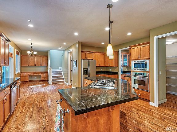 Oversized walk in pantry and perfect study area.  Did I mention there are two staircases? Easy access from the kitchen to upstairs as well!