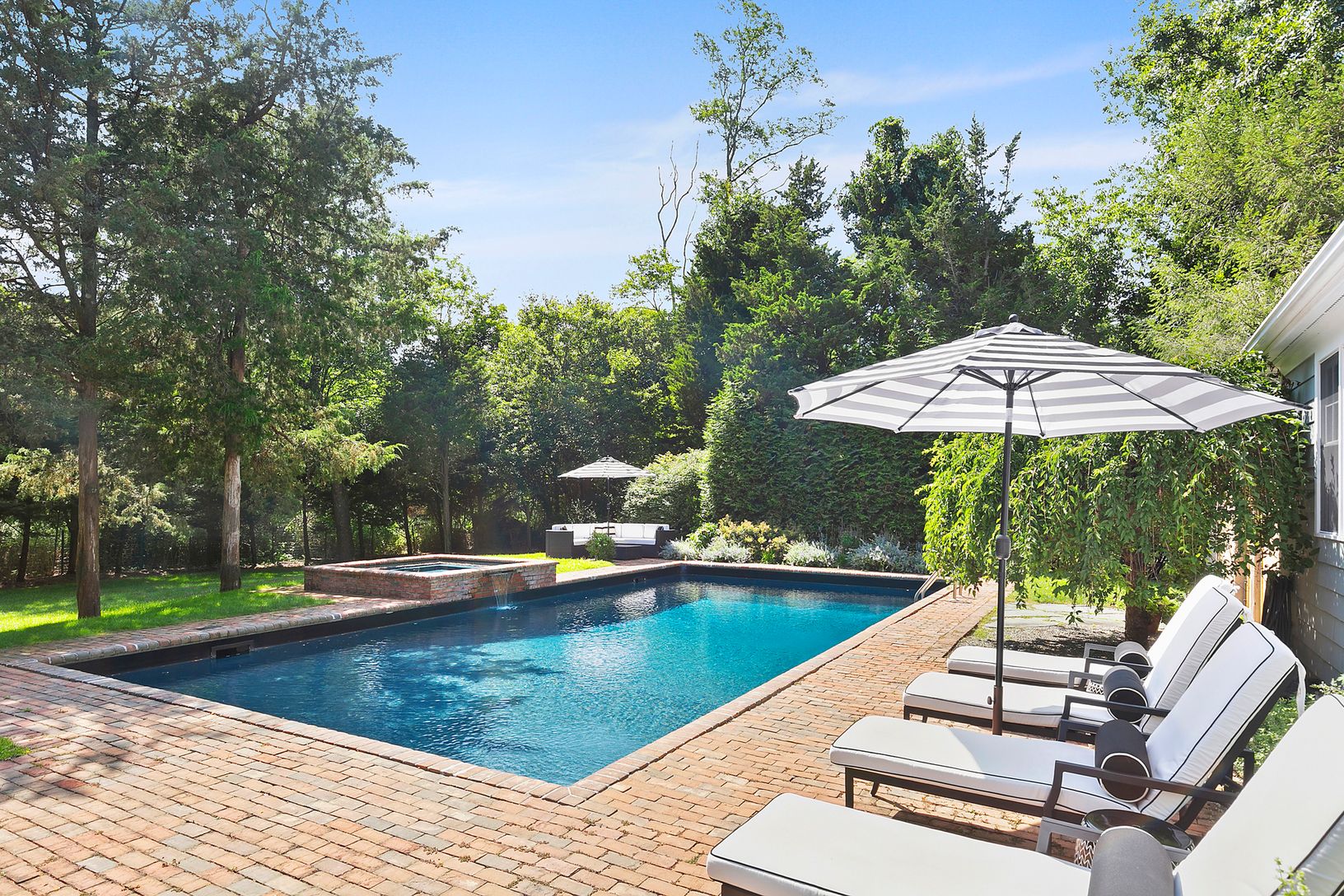  BRICK SURROUNDED POOL AND HOT TUB