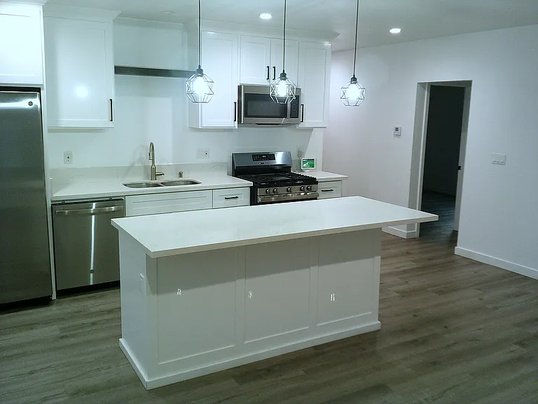 Kitchen View from Living Room space.