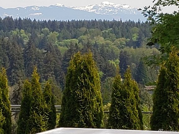 Beautiful! Mountain and territorial views from the main level, front deck and back yard.