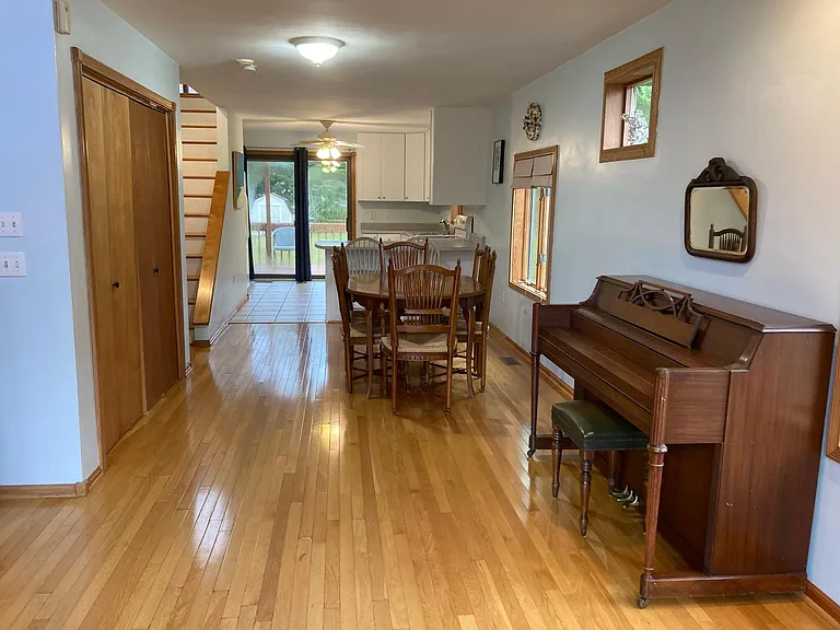 Entrance, facing the dining room and kitchen