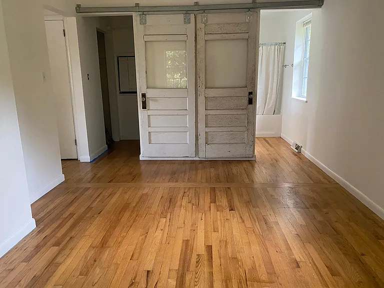 Sliding barn doors into bath and closet