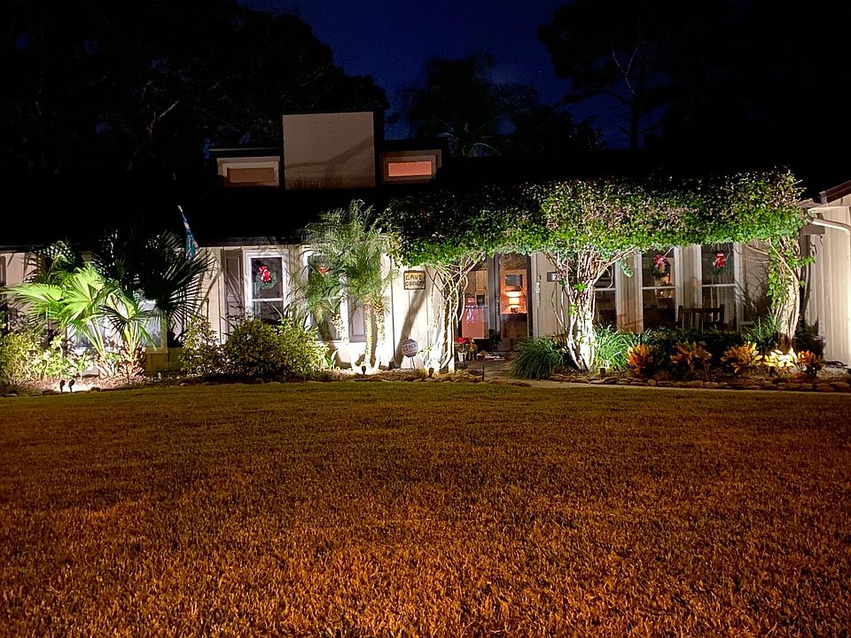 Front of the house with landscape lighting