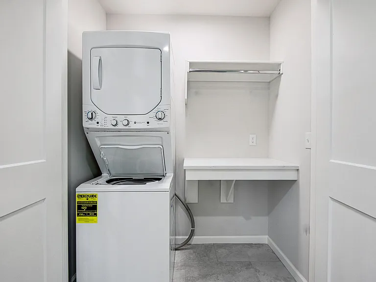 Unit comes with stackable washer and dryer.
