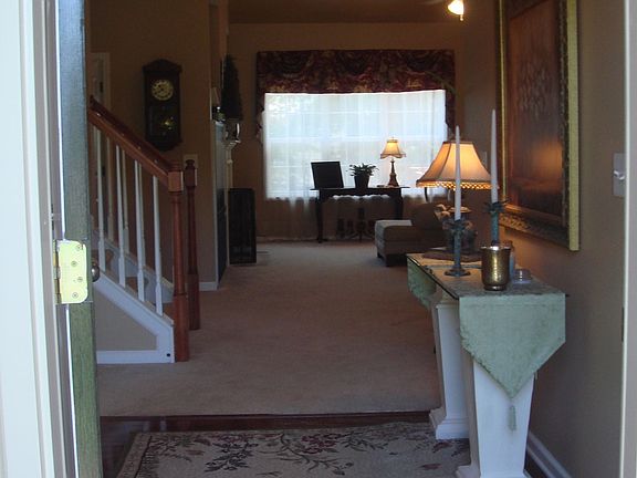 view from the front door: foyer (dining room to left, kitchen to the right)