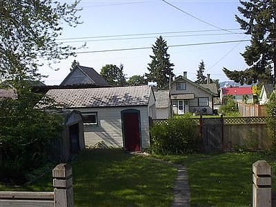 big back yard w garden space 