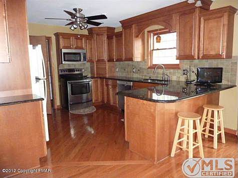 Kitchen with Granite and Hardwood