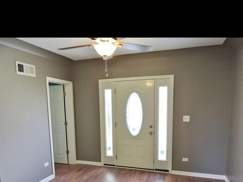 Inside front door from kitchen looking out