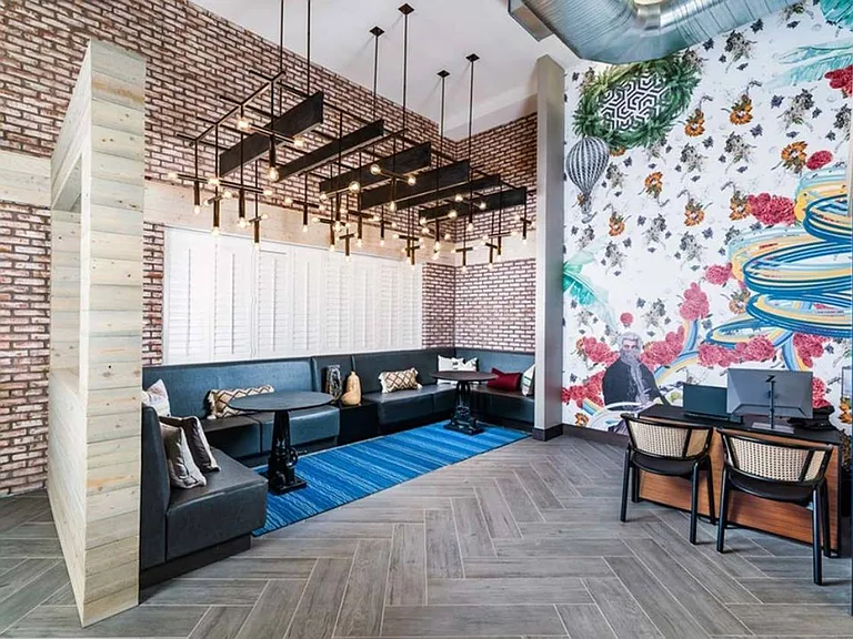 Unique design features abound throughout the community, including stylish lighting, colorful furnishings, and unique artwork. You'll find many places to work, lounge, host, and relax at Modera Founders Row.