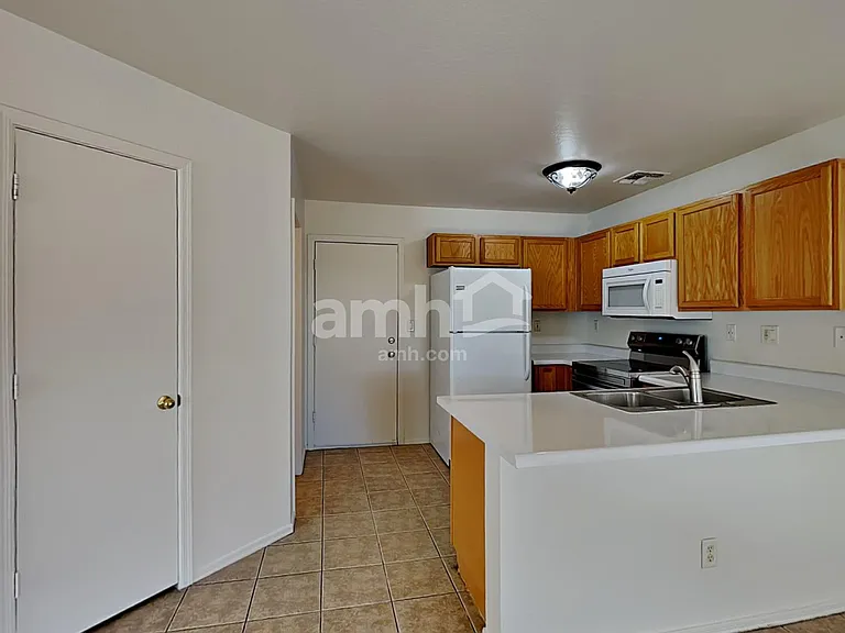 11019 E Arbor Ave — Photo 3