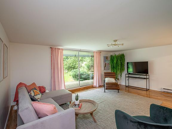 large family room with big sliders let in lots of light