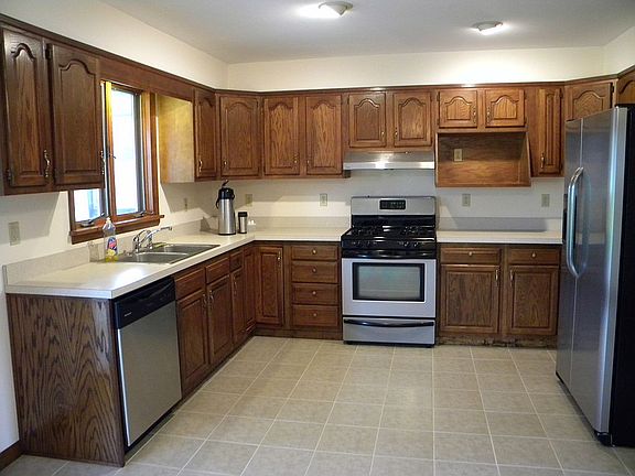 Kitchen w/ SS appliances.