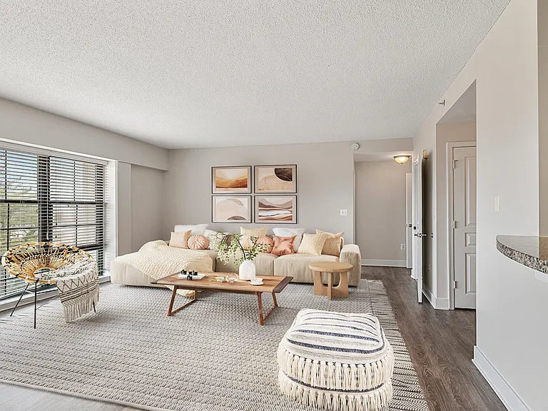 Living rooms have spacious floorplans with large windows for ample lighting