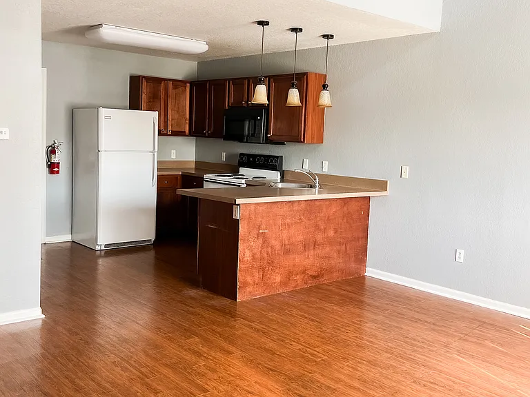 Kitchen with new grey painted walls.