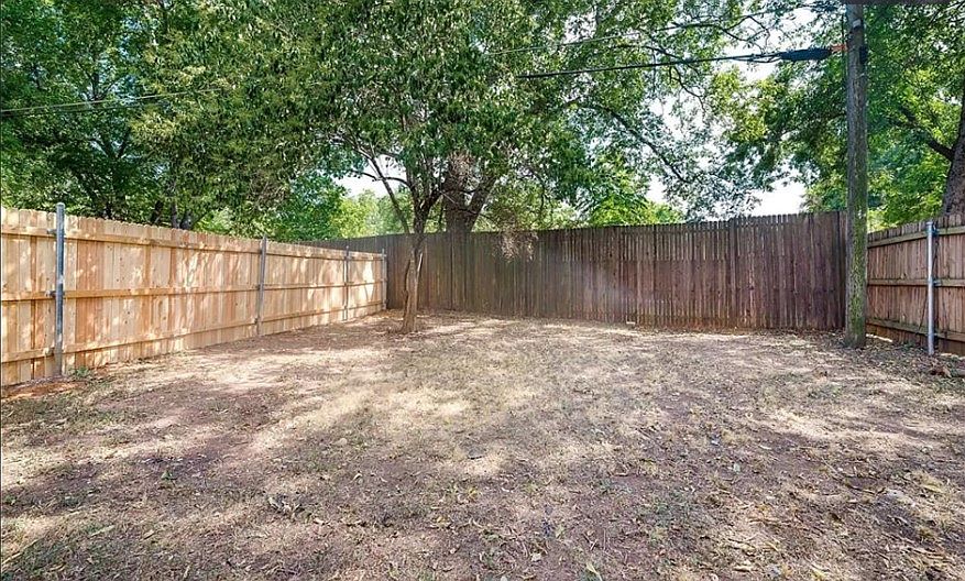 Private, fenced backyard