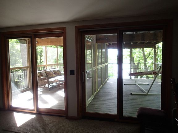 back
						:
						Lower level of the deck with double sliding glass doors