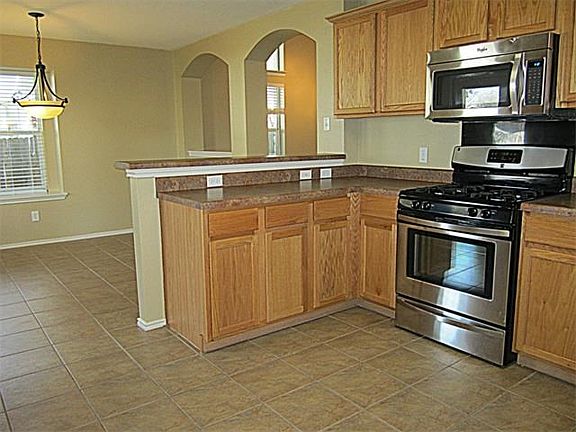 Stainless steel appliances. Refrigerator included!