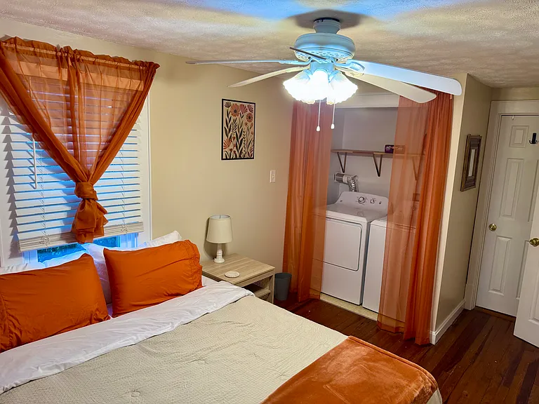 Second bedroom with laundry.