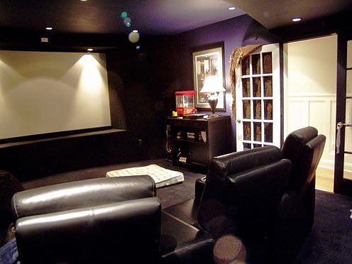 Stadium seating in the theater room!
