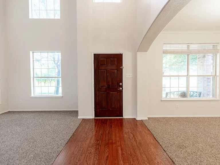 2 story entrance, with formal living and formal dining on either side of the entrance.