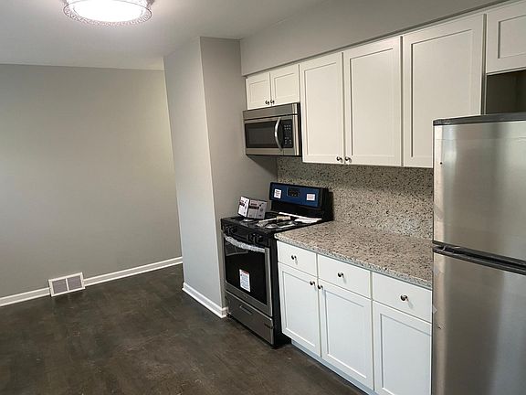 Gorgeous kitchen with BRAND NEW appliances, cabinets, and granite countertops.
