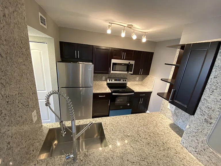 2810 N Oakland Forest Dr #104 — Photo 10