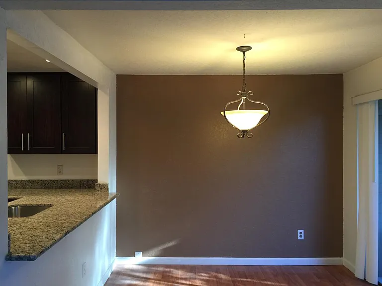 Dinning area with bar open to private patio