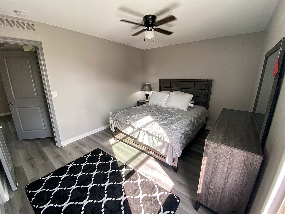 front view of room showing bright window reach for sunlight. spacious and ample storage in dresser, nightstand, and rcloset.