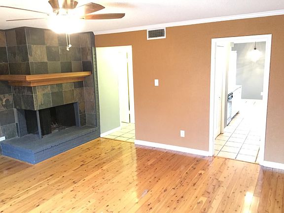 Living room facing fireplace